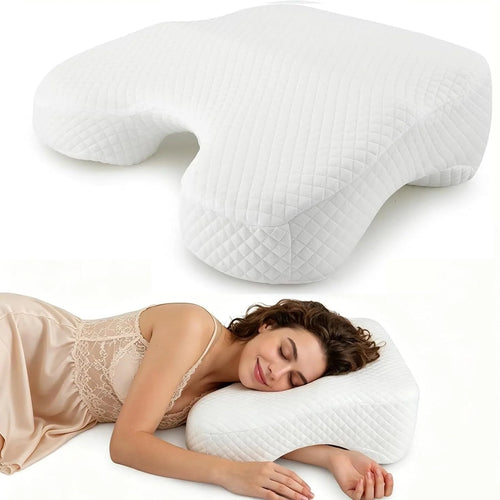 White Nester Dream Pillow with a side sleeper resting in the arm cutout