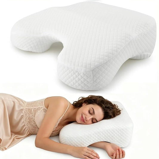 White Nester Dream Pillow with a side sleeper resting in the arm cutout